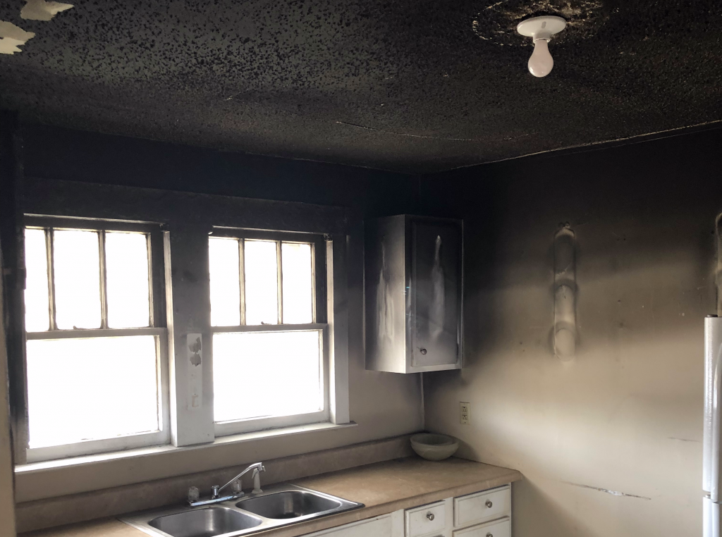 Heavy smoke and soot damage in a Portland kitchen after a fire