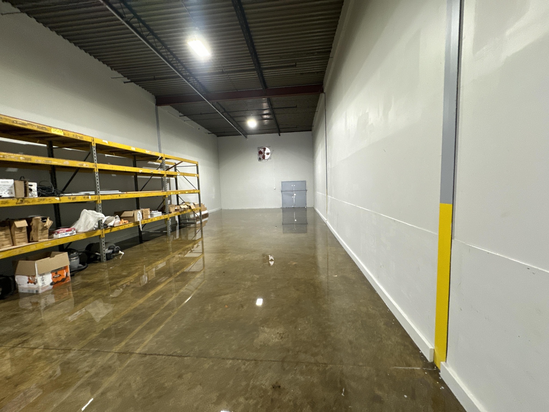 Warehouse shelves flooded after a storm event in Portland